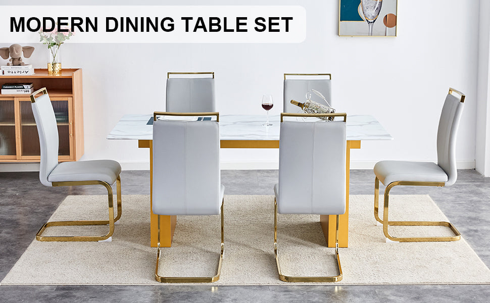 Table and chair set.Large modern rectangular table with 0.4 inch patterned glass tabletop and large MDF table legs.Comes with 6 chairs with faux leather cushioned seats and golden metal legs.