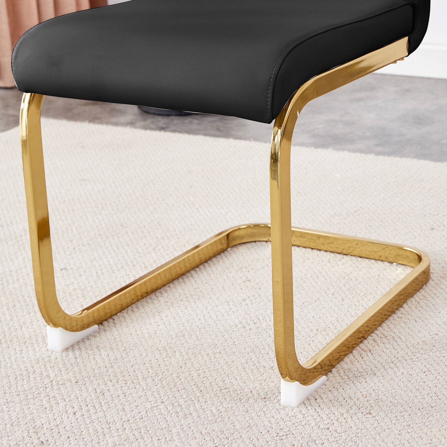 Table and chair set.Elegant Transparent Tempered Glass Dining Set - 71"x35.4" with 6 Black PU Chairs with golden C-tube metal leg.