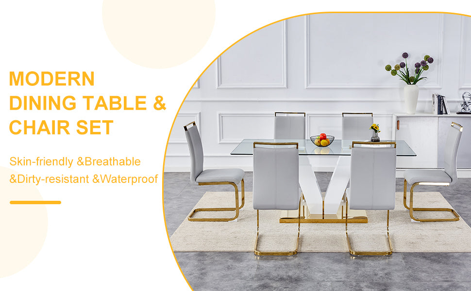 Table and chair set.Subtle Luxury Clear Tempered Glass Dining Set - 71"x35.4" with 6 Light Gray PU Chairs.C-tube Gold Metal Chair Legs.Bring a comfortable home experience to the kitchen, bedroom.