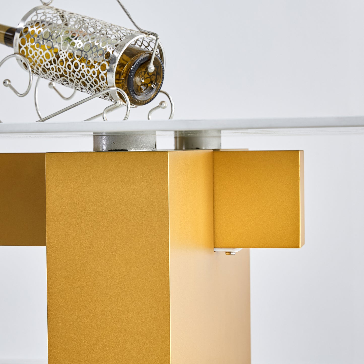 Table and chair set.Large modern rectangular table with 0.4 inch patterned glass tabletop and large MDF table legs.Comes with 6 chairs with faux leather cushioned seats and golden metal legs.