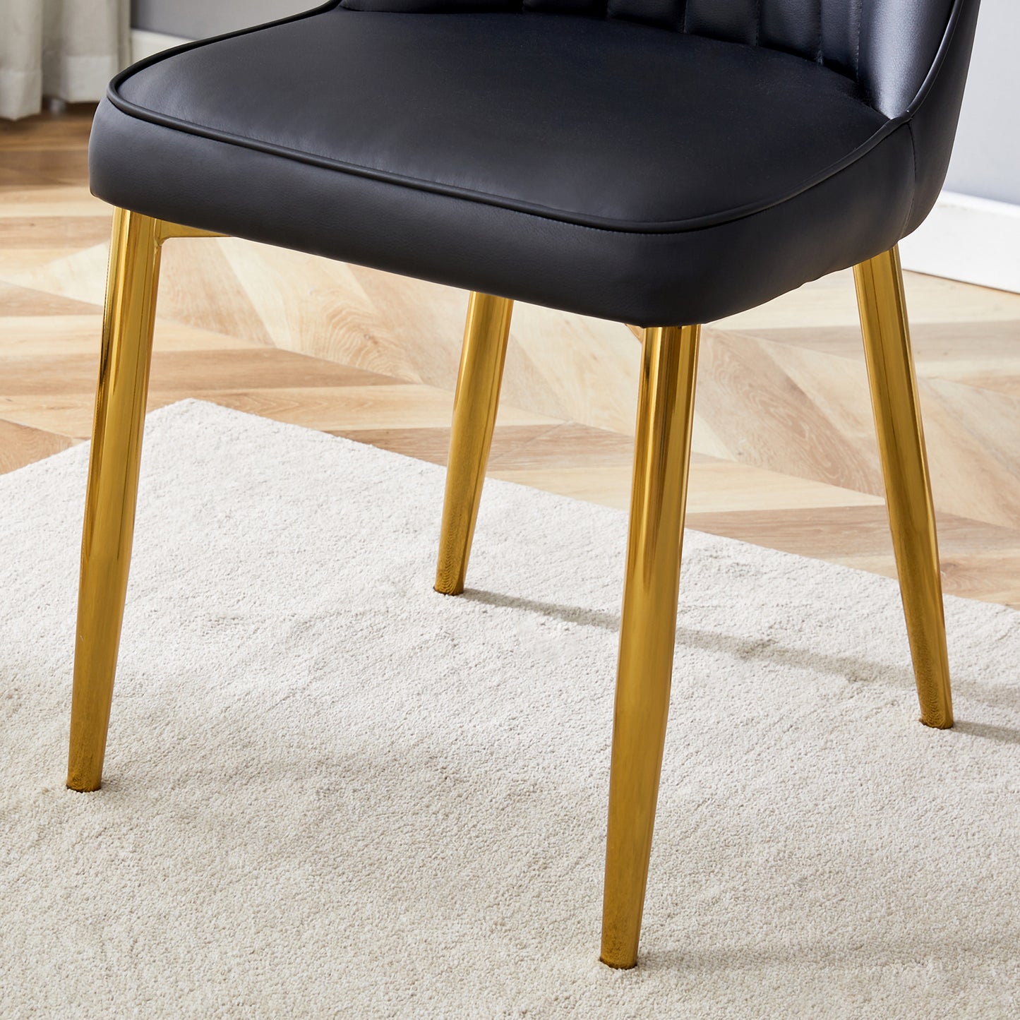 Table and chair set.36 Inch Diameter Modern Luxury Glass Dining Table and Chair Set - Gold Frame, Metal Legs.Two Black PU Chairs with Simple Line Designs On The Backrest.