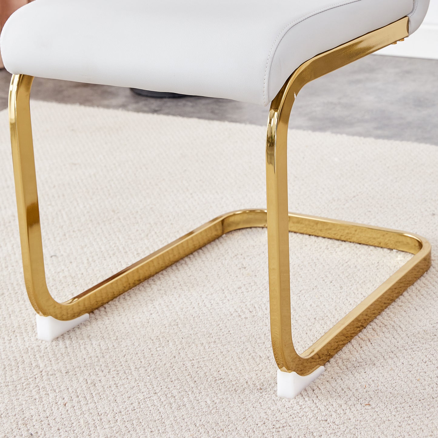 Table and chair set.Large modern rectangular table with 0.4 inch patterned glass tabletop and large MDF table legs.Comes with 6 chairs with faux leather cushioned seats and golden metal legs.