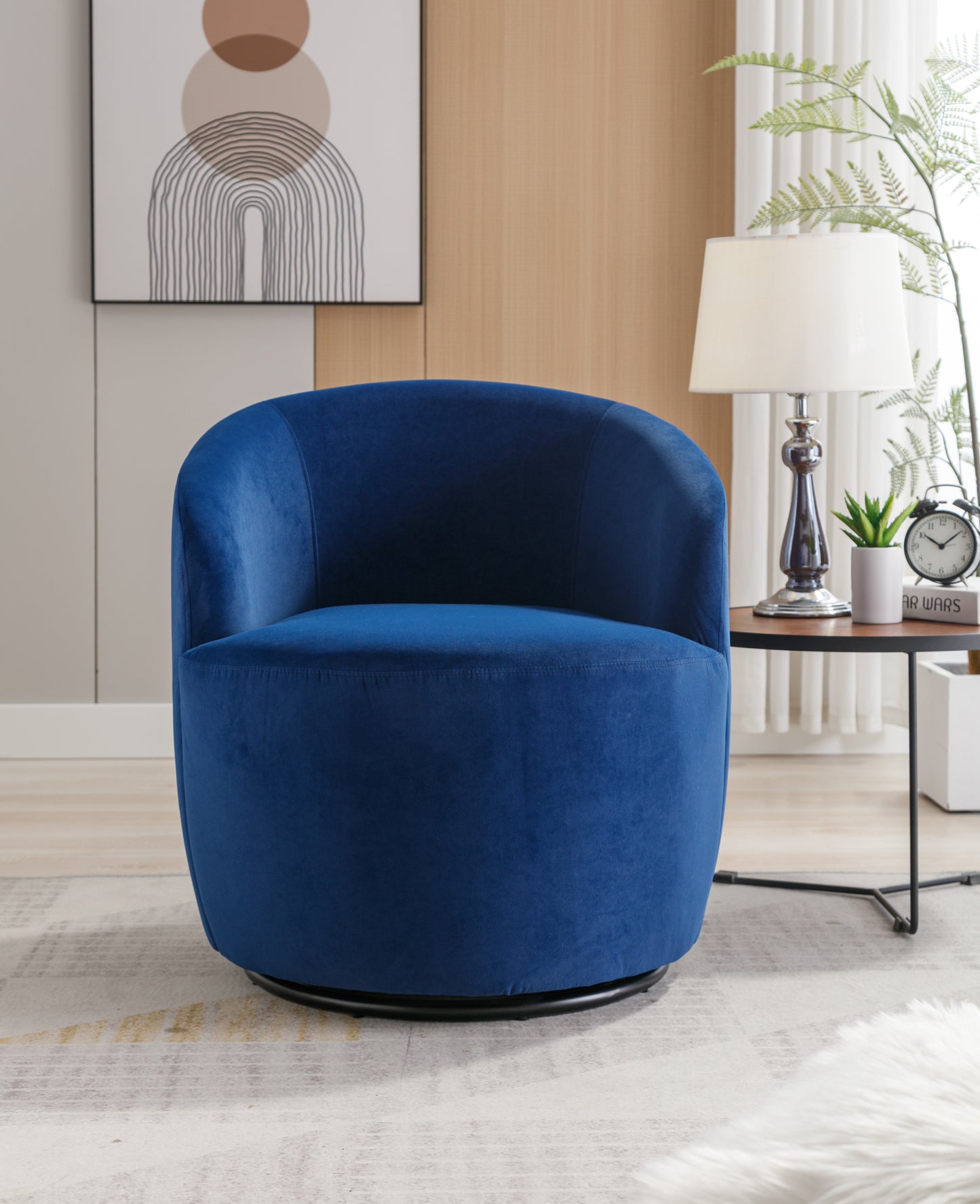 Sillón giratorio de terciopelo con acento tipo barril y aro metálico con revestimiento en polvo negro, color azul