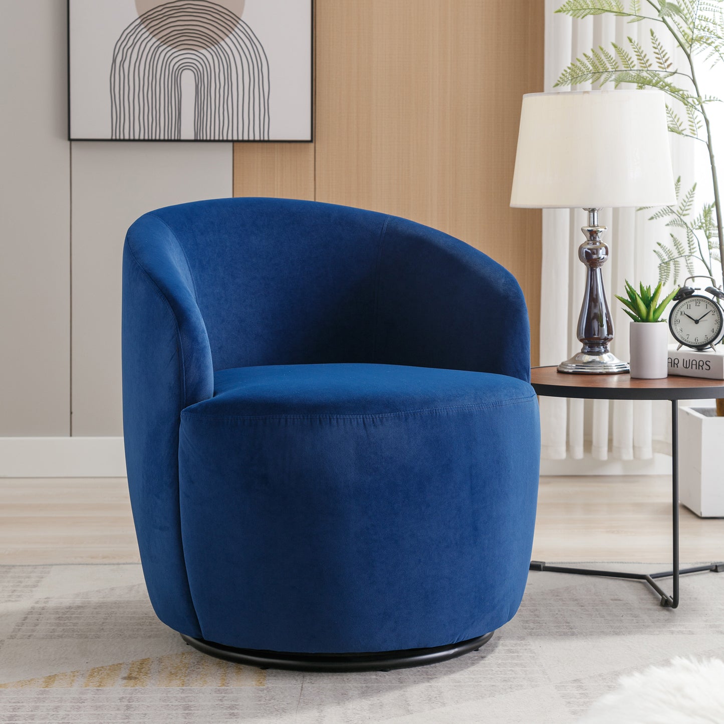 Sillón giratorio de terciopelo con acento tipo barril y aro metálico con revestimiento en polvo negro, color azul