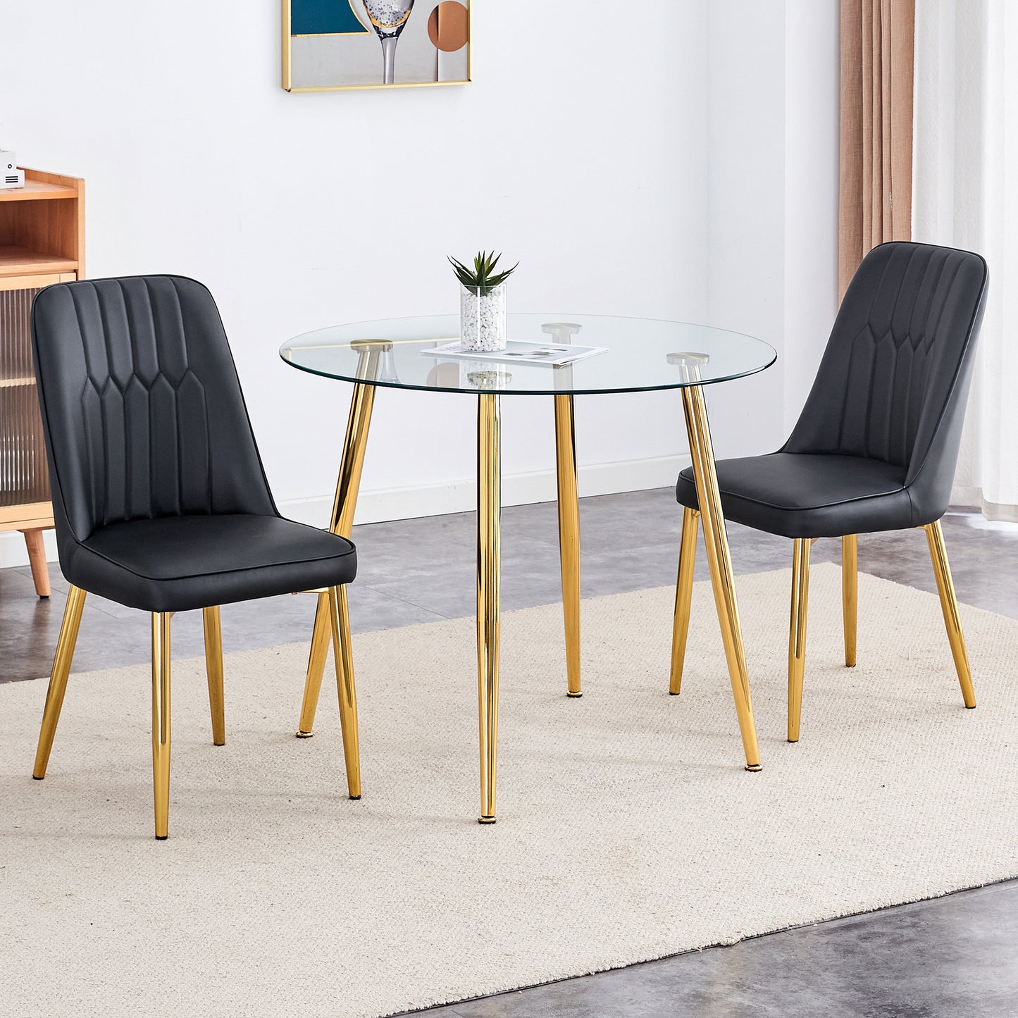 Table and chair set.36 Inch Diameter Modern Luxury Glass Dining Table and Chair Set - Gold Frame, Metal Legs.Two Black PU Chairs with Simple Line Designs On The Backrest.