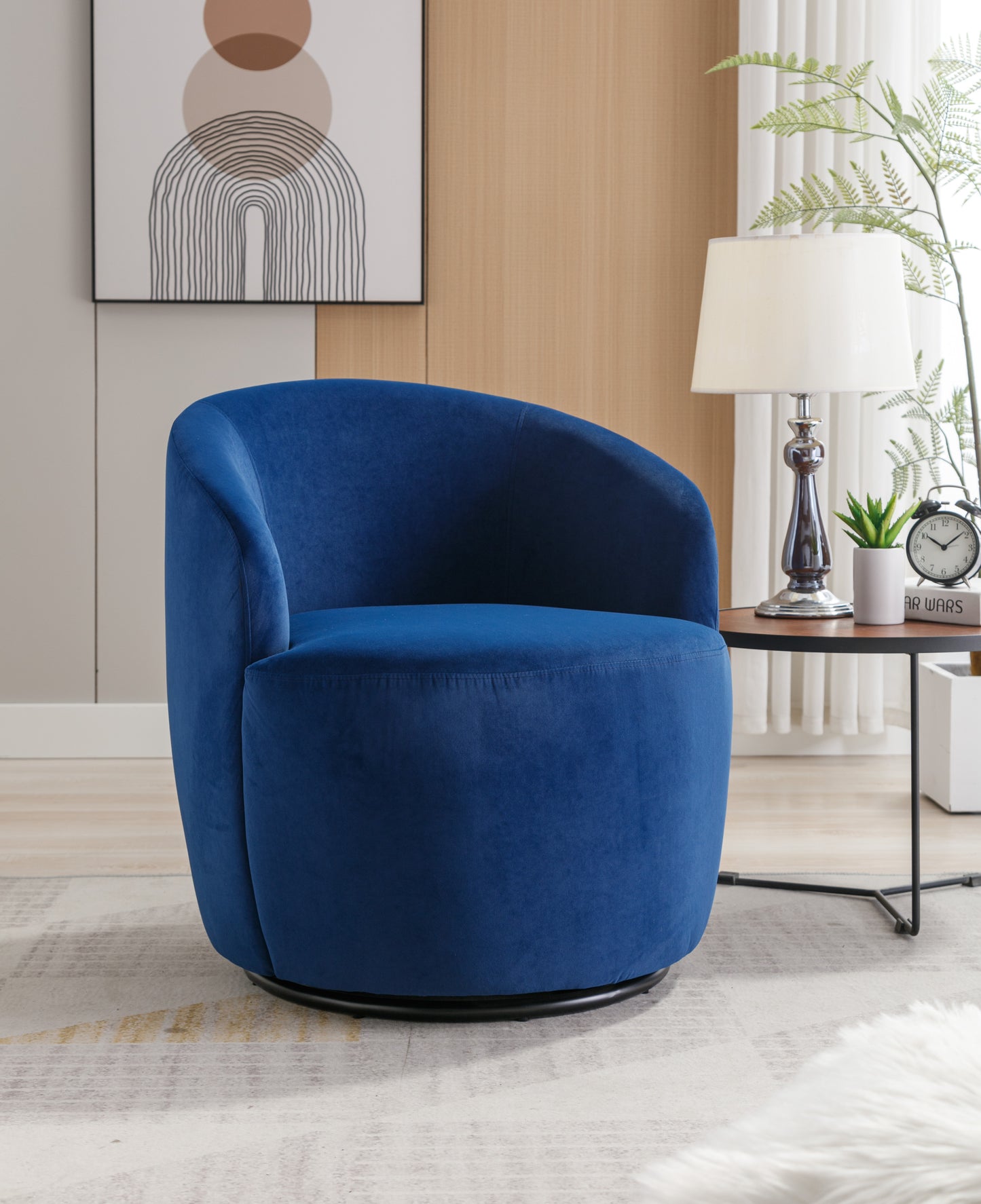 Sillón giratorio de terciopelo con acento tipo barril y aro metálico con revestimiento en polvo negro, color azul