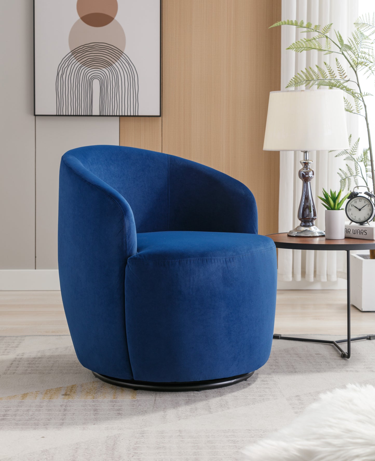 Sillón giratorio de terciopelo con acento tipo barril y aro metálico con revestimiento en polvo negro, color azul
