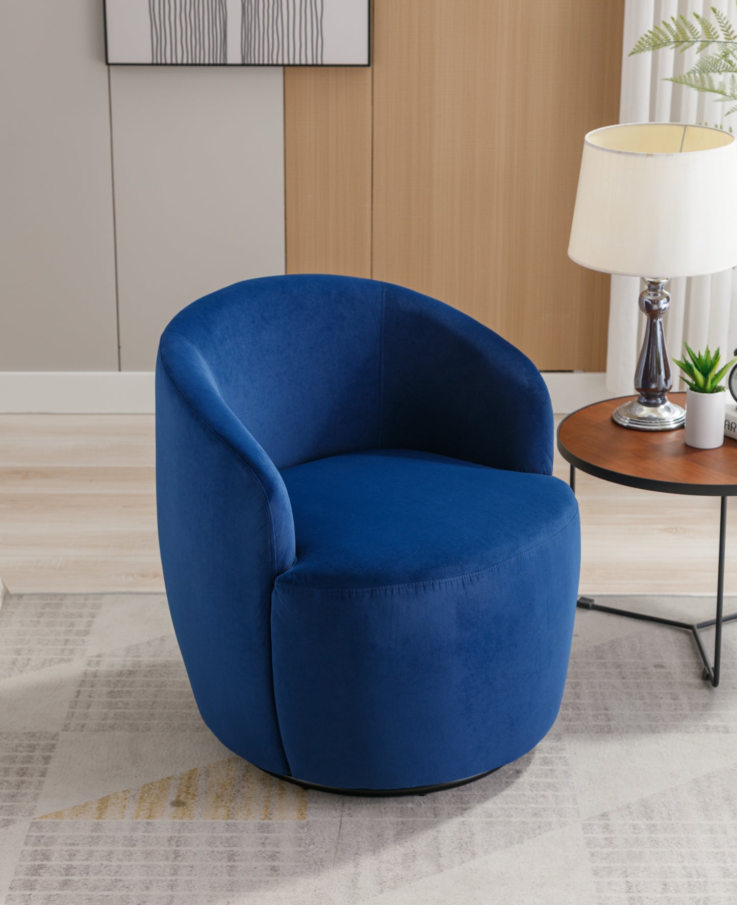Sillón giratorio de terciopelo con acento tipo barril y aro metálico con revestimiento en polvo negro, color azul