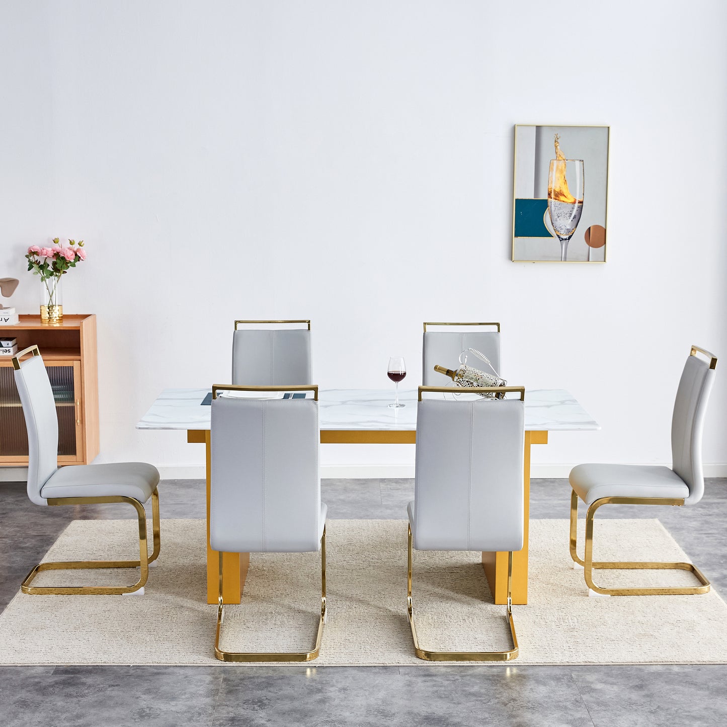 Table and chair set.Large modern rectangular table with 0.4 inch patterned glass tabletop and large MDF table legs.Comes with 6 chairs with faux leather cushioned seats and golden metal legs.