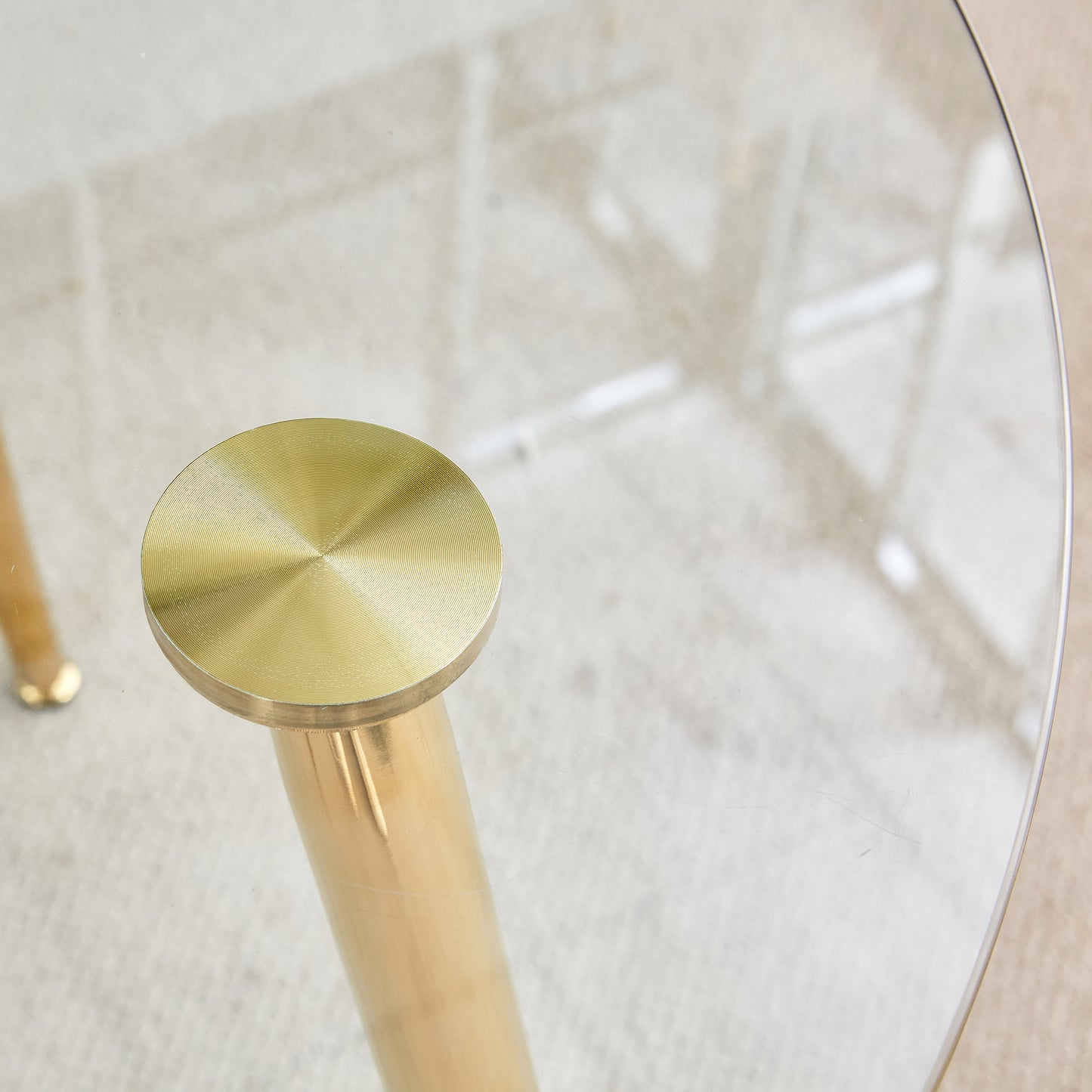 Table and chair set.36 Inch Diameter Modern Luxury Glass Dining Table and Chair Set - Gold Frame, Metal Legs.Two Black PU Chairs with Simple Line Designs On The Backrest.