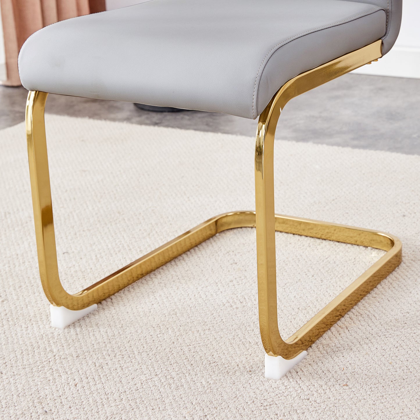 Table and chair set.Subtle Luxury Clear Tempered Glass Dining Set - 71"x35.4" with 6 Light Gray PU Chairs.C-tube Gold Metal Chair Legs.Bring a comfortable home experience to the kitchen, bedroom.