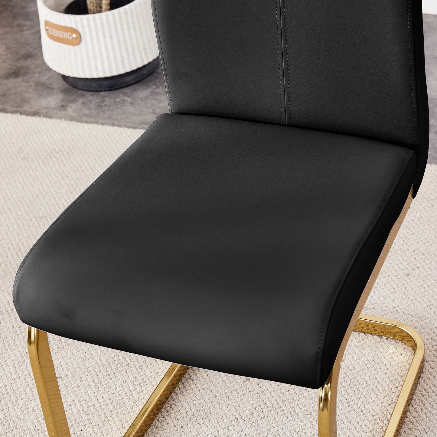 Table and chair set.Elegant Transparent Tempered Glass Dining Set - 71"x35.4" with 6 Black PU Chairs with golden C-tube metal leg.