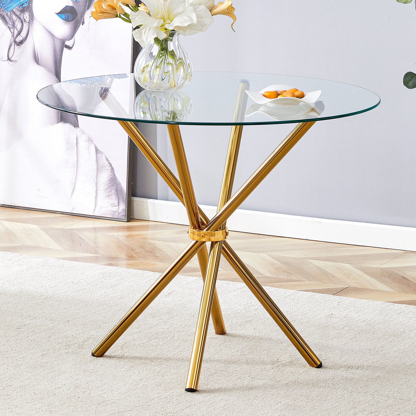 Round clear glass dining table with a unique shape for 4-6 people, with ring-shaped gathered gold metal legs, suitable for desks, kitchens, terraces, dining rooms.