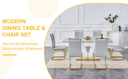 Table and chair set.Subtle Luxury Clear Tempered Glass Dining Set - 71"x35.4" with 6 Light Gray PU Chairs.C-tube Gold Metal Chair Legs.Bring a comfortable home experience to the kitchen, bedroom.