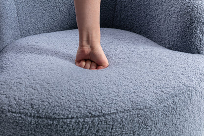 Sillón giratorio de tela Teddy con acento tipo barril y aro metálico con recubrimiento en polvo negro, azul claro