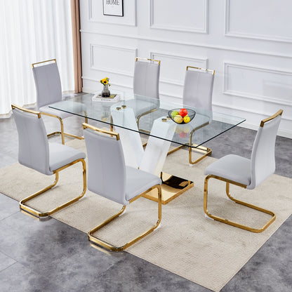Table and chair set.Subtle Luxury Clear Tempered Glass Dining Set - 71"x35.4" with 6 Light Gray PU Chairs.C-tube Gold Metal Chair Legs.Bring a comfortable home experience to the kitchen, bedroom.